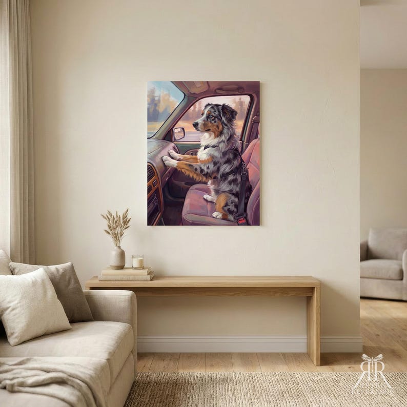 May include: A rectangular wall art print featuring a blue merle Australian Shepherd sitting in the passenger seat of a car. The dog is wearing a black harness and is looking out the window with its front paws resting on the dashboard.