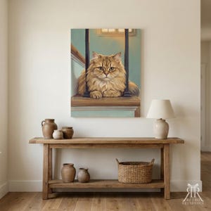 May include: A rectangular wall art print featuring a fluffy golden-brown cat sitting on a wooden staircase landing between dark vertical railings. The painting uses soft light and muted blue tones to depict the feline subject in a calm, seated pose.