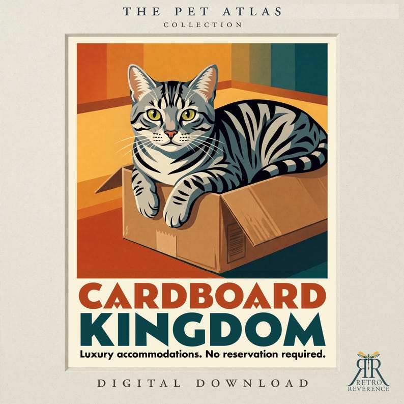 May include: A digital print featuring a gray tabby cat sitting in a brown cardboard box. The text reads THE PET ATLAS COLLECTION, CARDBOARD KINGDOM, Luxury accommodations. No reservation required., and DIGITAL DOWNLOAD. A logo for RETRO REVERENCE is in the corner.