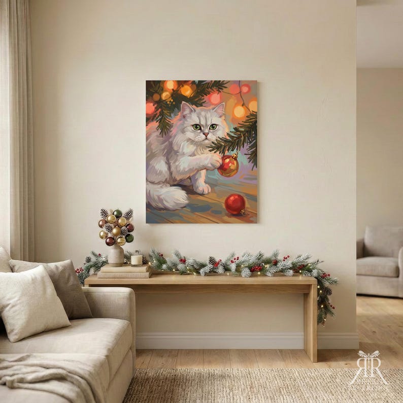 May include: A rectangular wall art print featuring a fluffy white cat sitting under a pine tree branch, reaching for a red Christmas ornament. The scene includes warm glowing lights, a wooden floor, and another red ornament on the ground.