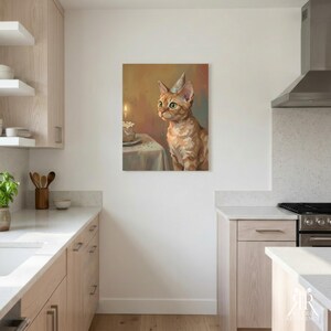 May include: A square wall art print featuring an orange tabby cat wearing a small party hat, sitting next to a birthday cake with a single lit candle on a table. The painting uses warm, soft tones and visible brushstrokes.