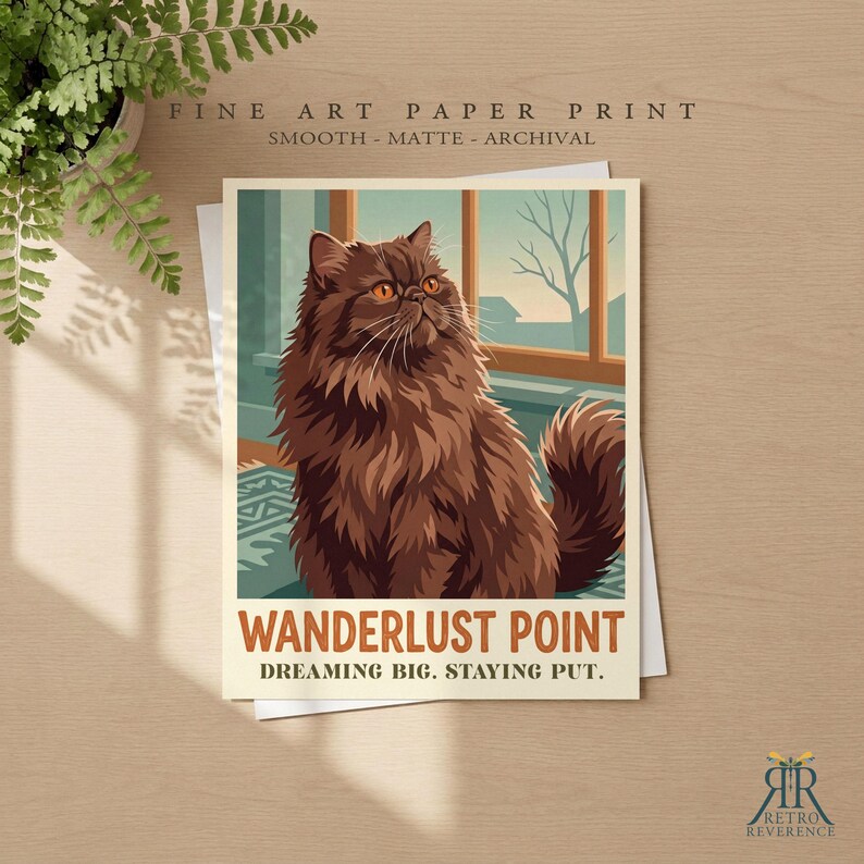 May include: A fine art paper print featuring a fluffy brown cat sitting indoors near a window. The text reads WANDERLUST POINT and DREAMING BIG. STAYING PUT. The print is smooth, matte, and archival, showcasing a detailed illustration of the cat.