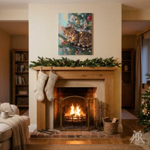 May include: A rectangular wall art print featuring a brown tabby cat resting in a decorated Christmas tree with ornaments and lights, displayed above a wooden fireplace mantel with two hanging knit stockings and a lit fire in the hearth.
