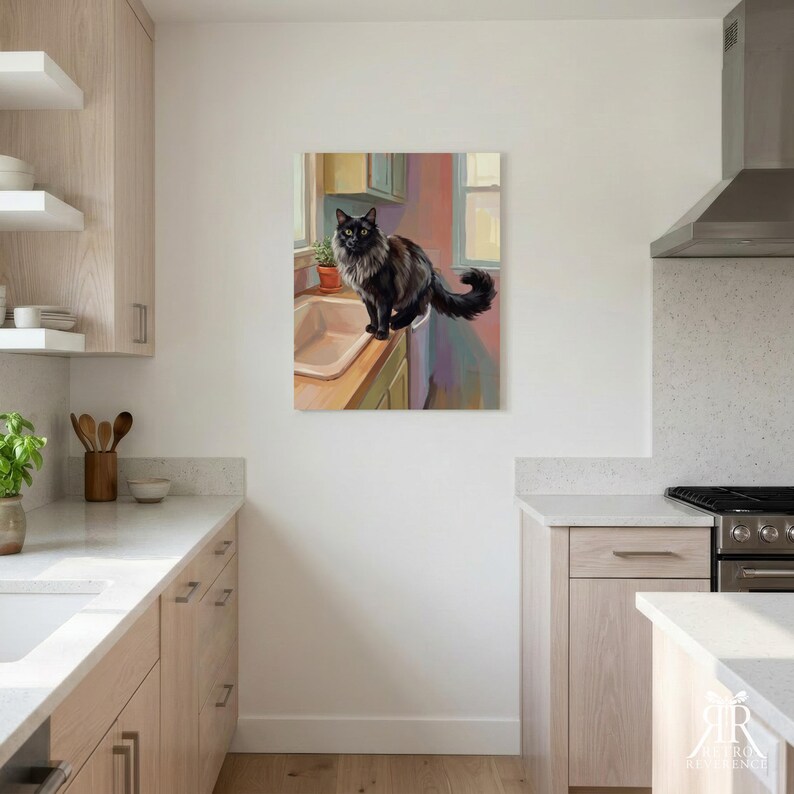 May include: A square wall art print featuring a painting of a fluffy black cat with long fur sitting on the edge of a kitchen sink. The cat has bright yellow eyes and a bushy tail. The background shows a window, a small potted plant, and cabinets.