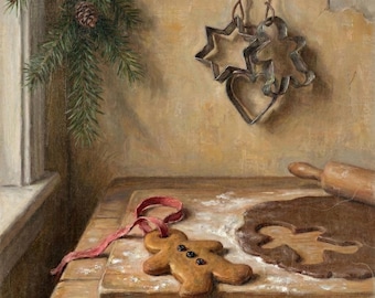 May include: A gingerbread person cookie with a red ribbon and three dark buttons, a wooden board with rolled dough, a rolling pin, and three metal cookie cutters in star, heart, and person shapes hanging on a wall near a pine branch.