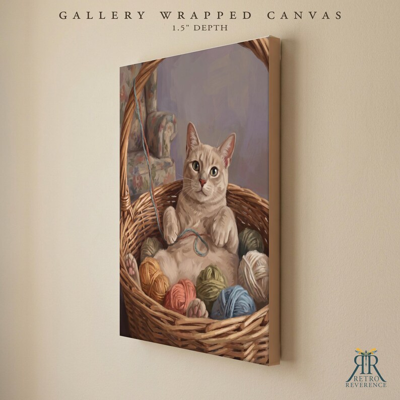 May include: A gallery wrapped canvas with a 1.5 inch depth featuring a painting of a light-colored cat sitting inside a woven wicker basket filled with various colorful balls of yarn. The cat is looking forward with its paws resting on the yarn.