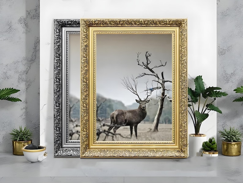 Ornate gold and silver picture frames displaying wildlife wall art on light grey surface, styled as elegant home decor. Decorative poster frame and photo frame design with vintage detailing, perfect for living room decor, office decor, farmhouse decor, and classic gallery wall styling