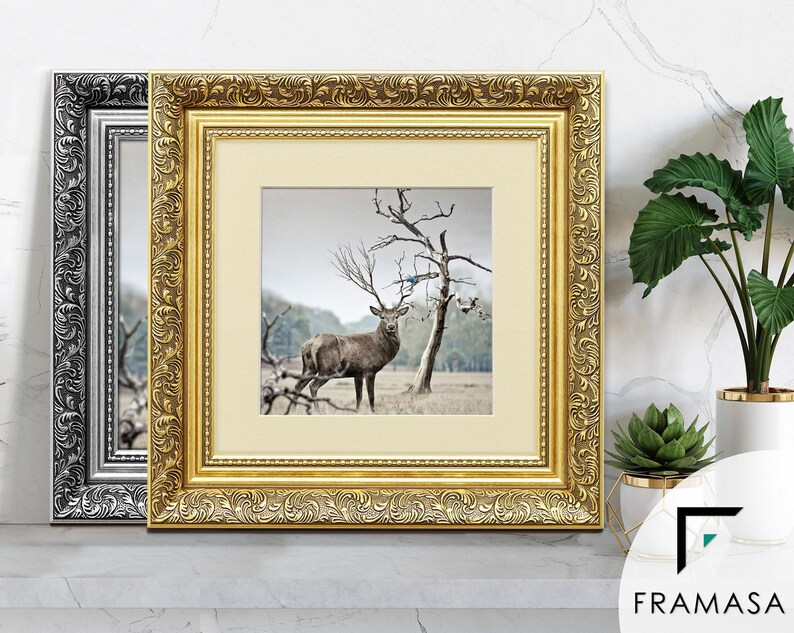 Ornate gold and silver square picture frames With Ivory matt & vintage detailing displaying wildlife wall art on shelf, styled as elegant home decor. perfect for living room decor, office decor, farmhouse decor, and classic gallery wall styling