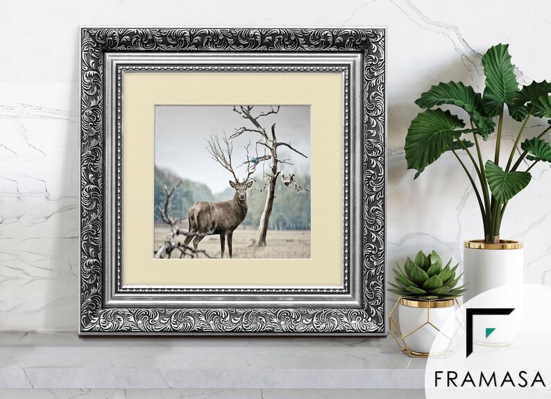 Traditional Ornate silver square picture frame with ivory mount & vintage detailing displaying wildlife wall art on light grey surface, styled as elegant home decor. perfect for living room decor, office decor, farmhouse decor, and classic gallery wall styling