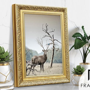 Ornate gold picture frame featuring sideview on light grey surface, styled as elegant home decor. Decorative traditional poster frame and photo frame with intricate vintage detailing, perfect for living room decor, office decor, farmhouse decor, and classic gallery wall display