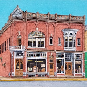 May include: A watercolor painting of a red brick building with three storefronts. The building has a sign that reads "101 Hardware" and another sign that reads "91 Hallett". The storefronts are for "Hardware", "Books", and "Antiques".