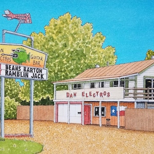 May include: Watercolor painting of a roadside bar called Dan Electros Guitar Bar. The sign features a cartoon fish wearing sunglasses. The bar has a Texas flag and a sign listing bands. A red airplane weathervane sits atop the sign.