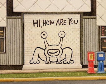 May include: A white brick wall with black graffiti of a cartoon creature with the words "HI, HOW ARE YOU" above it. The creature has two large eyes, a wide smile, and four limbs. There are red, blue, and green newspaper boxes in front of the wall.
