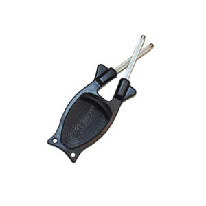 May include: A black handheld knife sharpener featuring a contoured handle with a textured oval grip area and two crossed metallic sharpening rods extending from the top. The base of the handle includes two small circular holes for mounting.