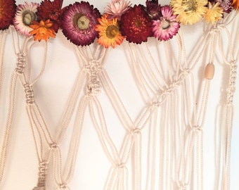 Macramé photo holder and dried flowers