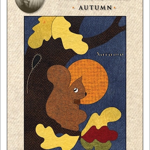 May include: A fabric panel titled "Ruby's Four Seasons Appliqué Panels - Autumn" features a brown squirrel, yellow leaves, and a large orange circle against a dark blue background. The finished panel size is 15 cm x 20 cm.