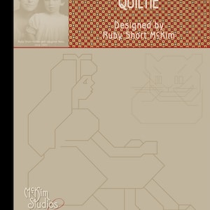May include: A black and white line drawing of Alice in Wonderland sitting on a chair with a cat beside her. The drawing is on a beige background with the text "Alice in Wonderland Quiltie" and "Designed by Ruby Short McKim" at the top. The text "McKim Studios revival" and "RUBY SHORT MCKIM" is at the bottom of the image.