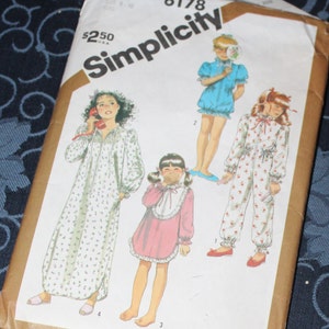 May include: Simplicity sewing pattern number 6178 for girls' sleepwear. The pattern includes four different styles: a long nightgown with floral print, a short nightgown with a ruffled collar and trim, a long-sleeved pyjama set with a floral print, and a short-sleeved pyjama set with a floral print.