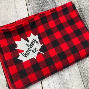 Buffalo Check blanket with red lining, hockey life embroidery throw blanket in red, and black. Canadiana, soft blanket lining cottage decor, home decor