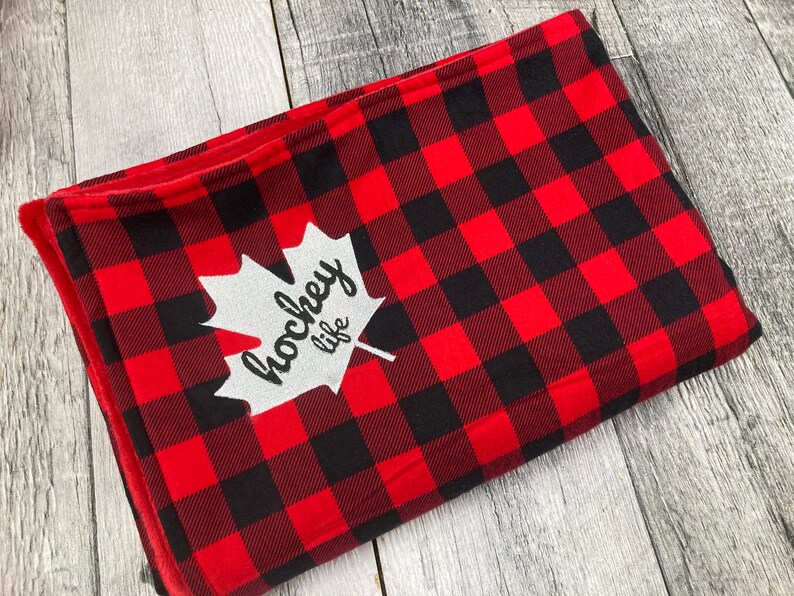 Buffalo Check blanket with red lining, hockey life embroidery throw blanket in red, and black. Canadiana, soft blanket lining cottage decor, home decor