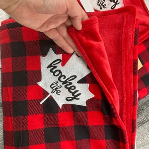 inside red lining on hockey life embroidery