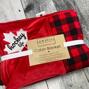 Buffalo Check blanket with red lining, hockey life embroidery throw blanket in red, and black. Canadiana, soft blanket lining cottage decor, home decor