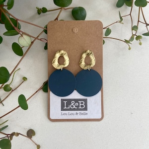 Matt dark blue coloured disc and brass earrings