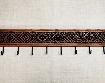 Big etno-patterned oak coat rack for wall with ten hooks