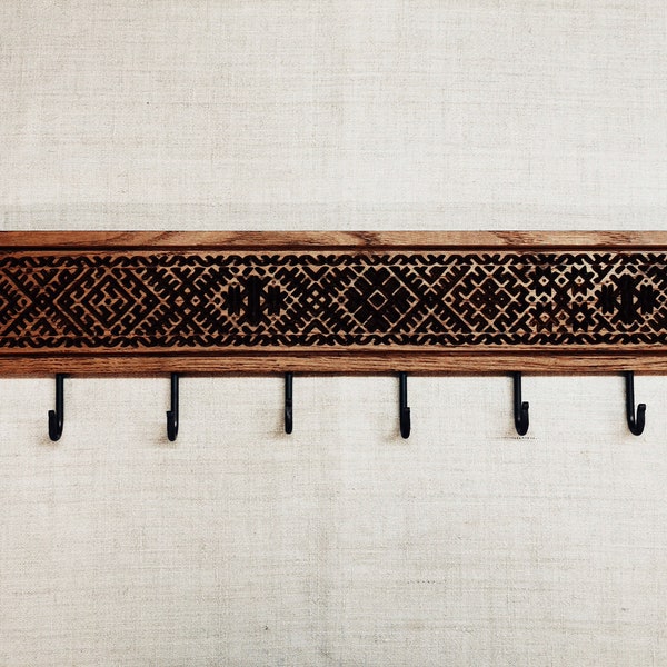 Big etno-patterned oak coat rack for wall with ten hooks