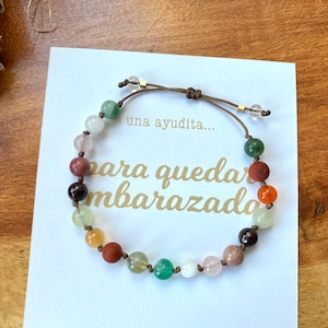 Pulsera de piedras energéticas para quedar embarazada piedras para mejorar la fertilidad vela de intención kit de limpieza energética imagen 1