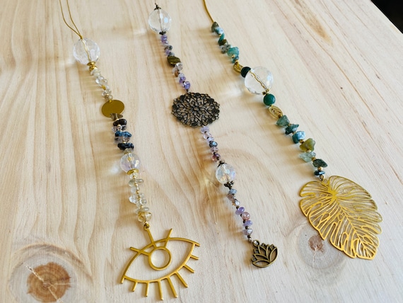 Suncatcher with quartz and energy stones, with mandalas, lotus flower, monstera leaf and Turkish eye - fill your house with good energy