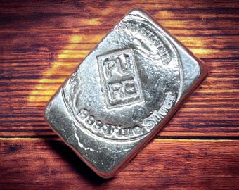 Barra plana de 1 onza troy (pura) - Plata maciza - 999fs.