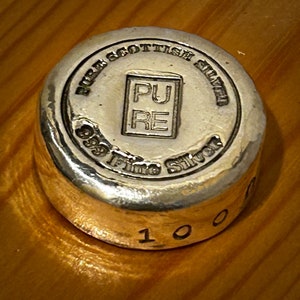 100g .999 Fine Silver Round: Pure Puck Collectible