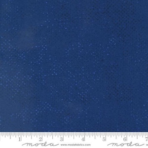 May include: A solid blue fabric with a subtle speckled pattern. The fabric is shown with a ruler for scale. The ruler has the word "moda" printed on it.