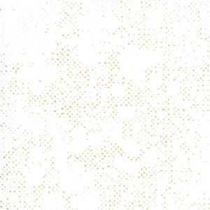 May include: White background with a scattered pattern of small gold dots.