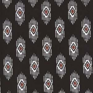 May include: A black fabric with a repeating pattern of white and brown diamond shapes. The diamonds are outlined in white and have a brown center. The pattern is a simple geometric design.