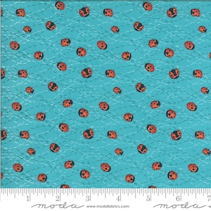 May include: A turquoise fabric with a repeating pattern of red ladybugs. The fabric has a white grid pattern with thin lines.