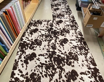 Faux cow hide upholstery fabric one piece small side 7'x26", large side 66"x56"