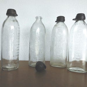 Antique Nursing Bottles - set of 4 with rubber caps