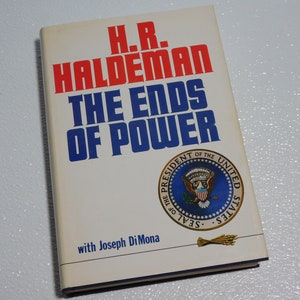 May include: A white book with blue and red text on the cover. The title is "H.R. Haldeman The Ends of Power" with the text "with Joseph Di Mona" below the title. The cover also features the Presidential Seal of the United States.