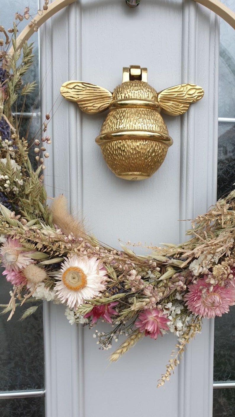 Bee door knocker by brass bee