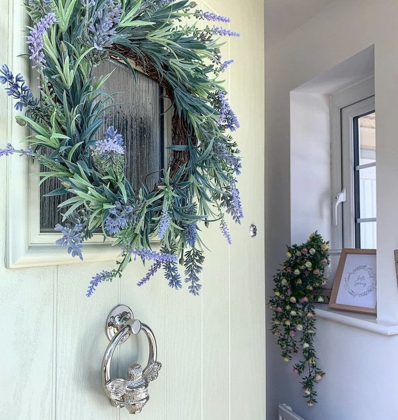 Bee door knocker by brass bee