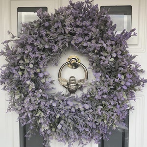 Bee door knocker by brass bee