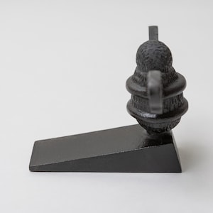 Messing deurstopper wig | Zware gietijzeren deurstopper