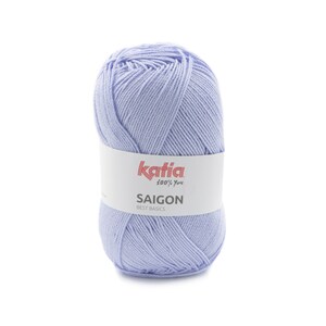 May include: A ball of light blue yarn with a white label that says "Katia 100% You" and "SAIGON BEST BASICS"