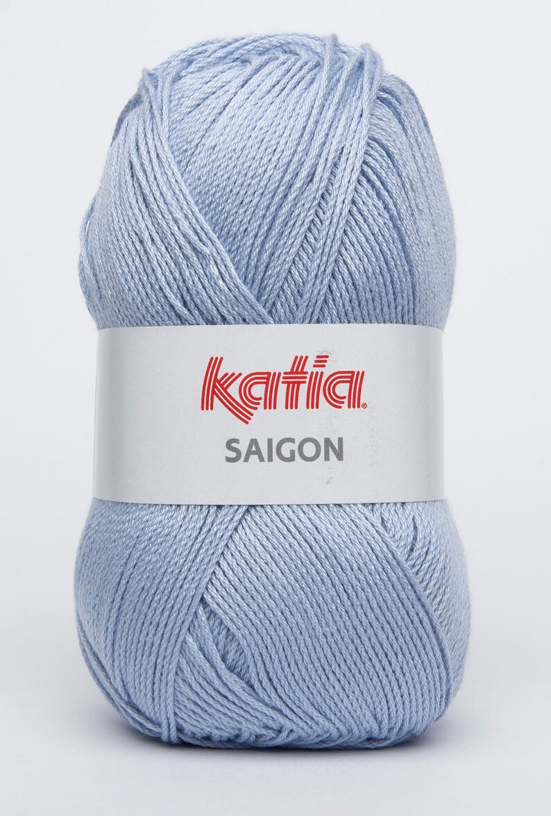 May include: A ball of light blue yarn with the Katia brand label and the text "SAIGON" on it.