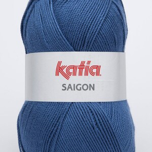 May include: A ball of Katia Saigon yarn in a blue shade. The label reads "Katia Saigon".