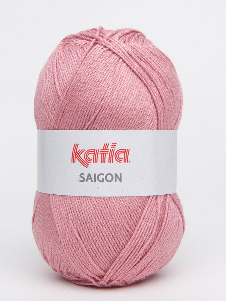 May include: A ball of pink yarn labeled "Katia Saigon"