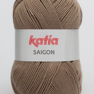 May include: A ball of Katia Saigon yarn in a light brown color. The yarn is made of 100% cotton and is suitable for knitting and crocheting.