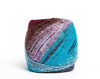 May include: A colorful ball of yarn with a gradient of colors, including teal, purple, and brown. The yarn is tightly wound, showing a textured surface. Ideal for knitting or crocheting projects.
